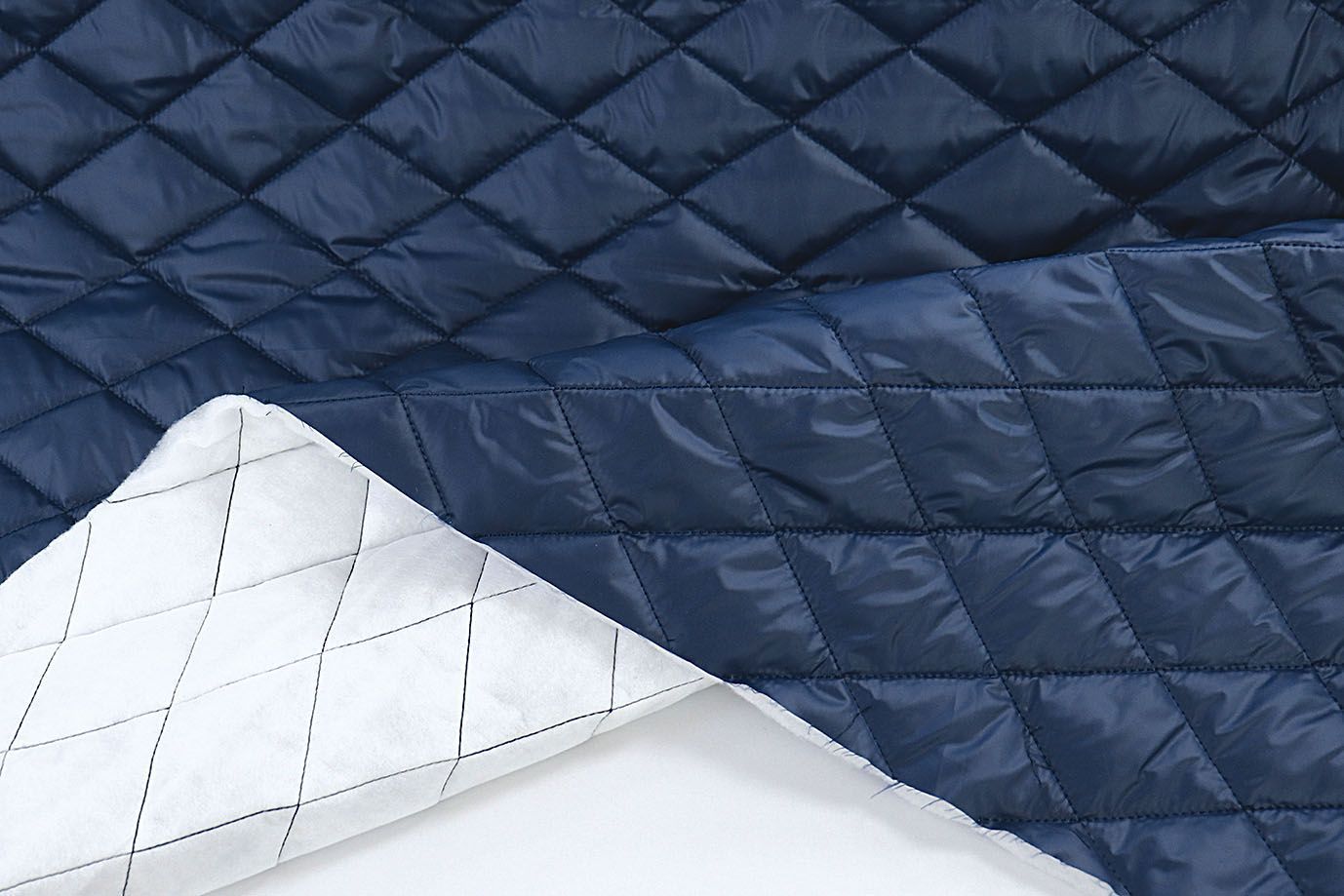 Ткань простеганная "Ромб"/синий 1254/25+холлофайбер 200